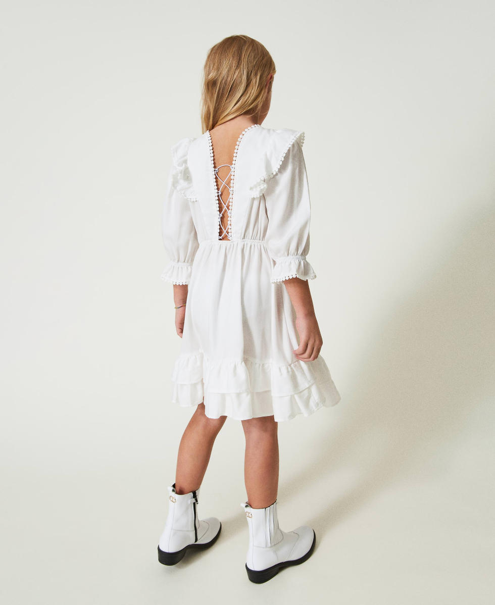 Robe courte avec volants et pompons