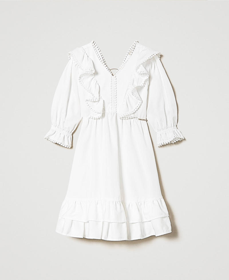 Short dress with ruffles and pompoms