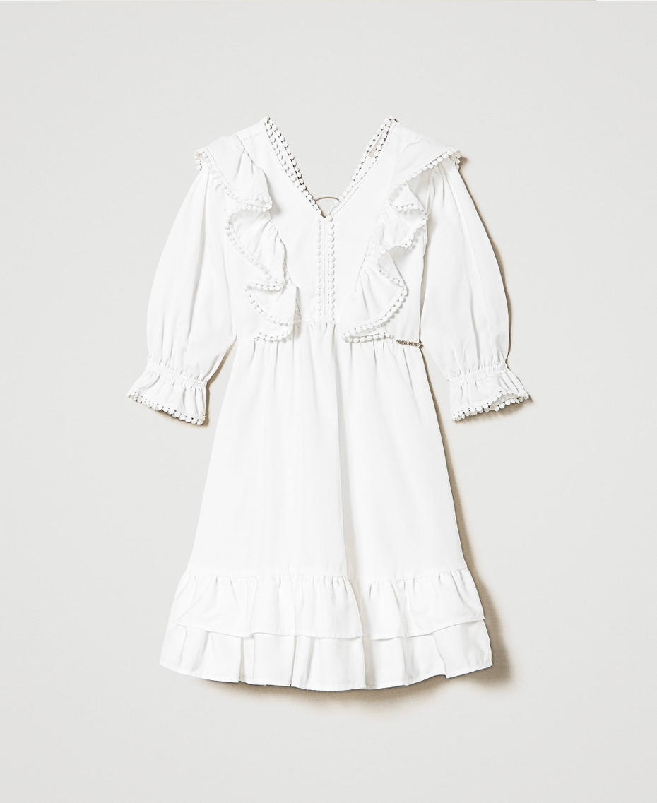 Short dress with ruffles and pompoms