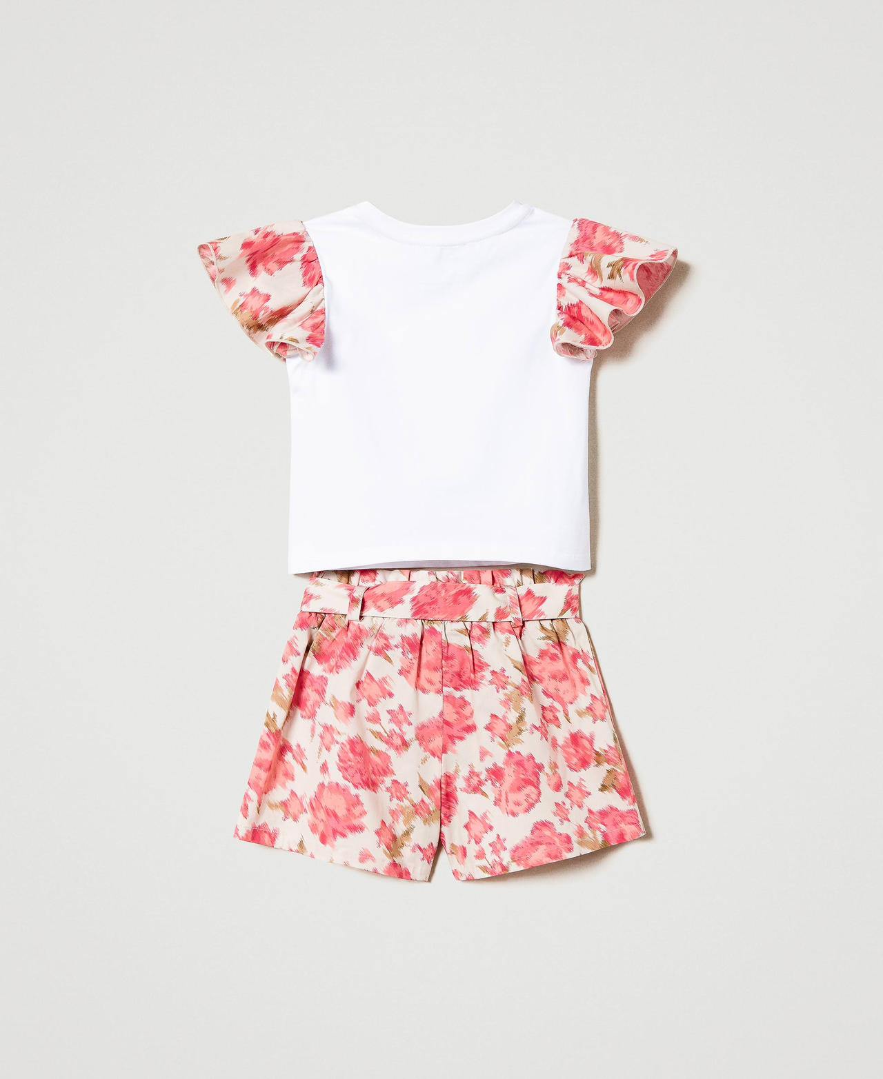 T-shirt with floral sleeves and shorts