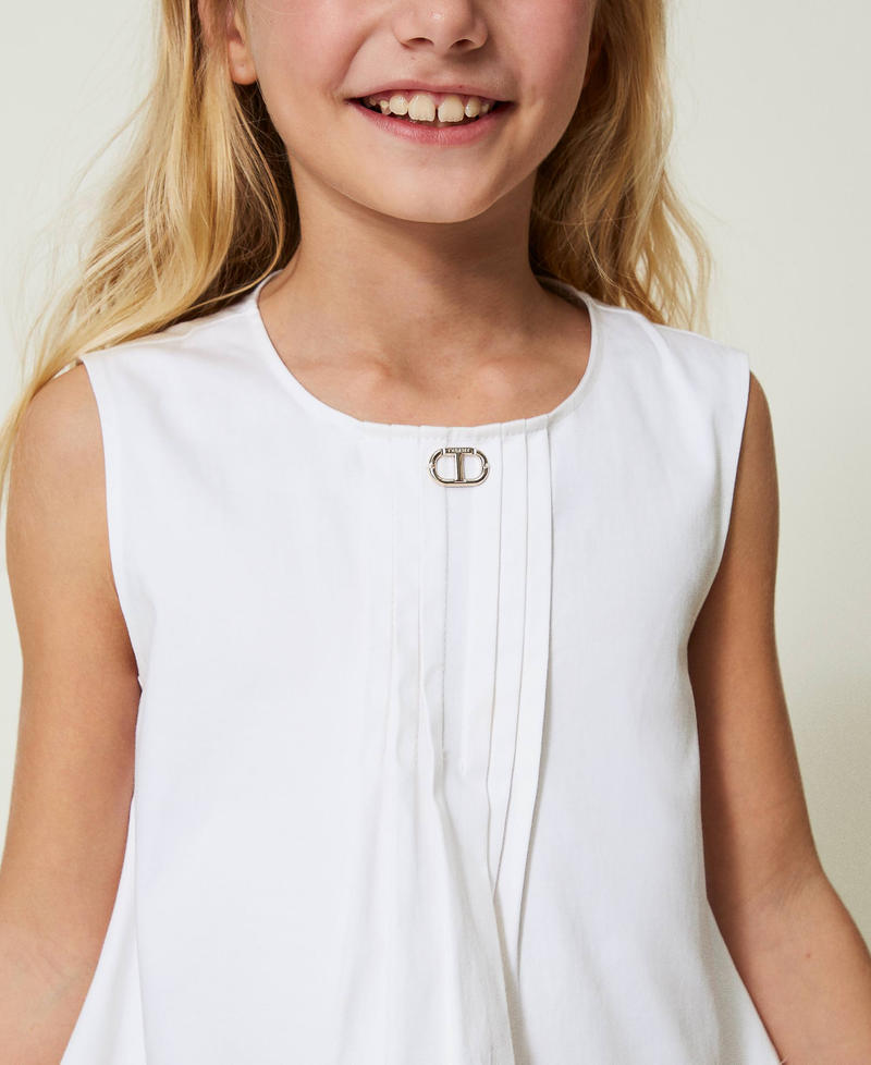 Top with front pleats