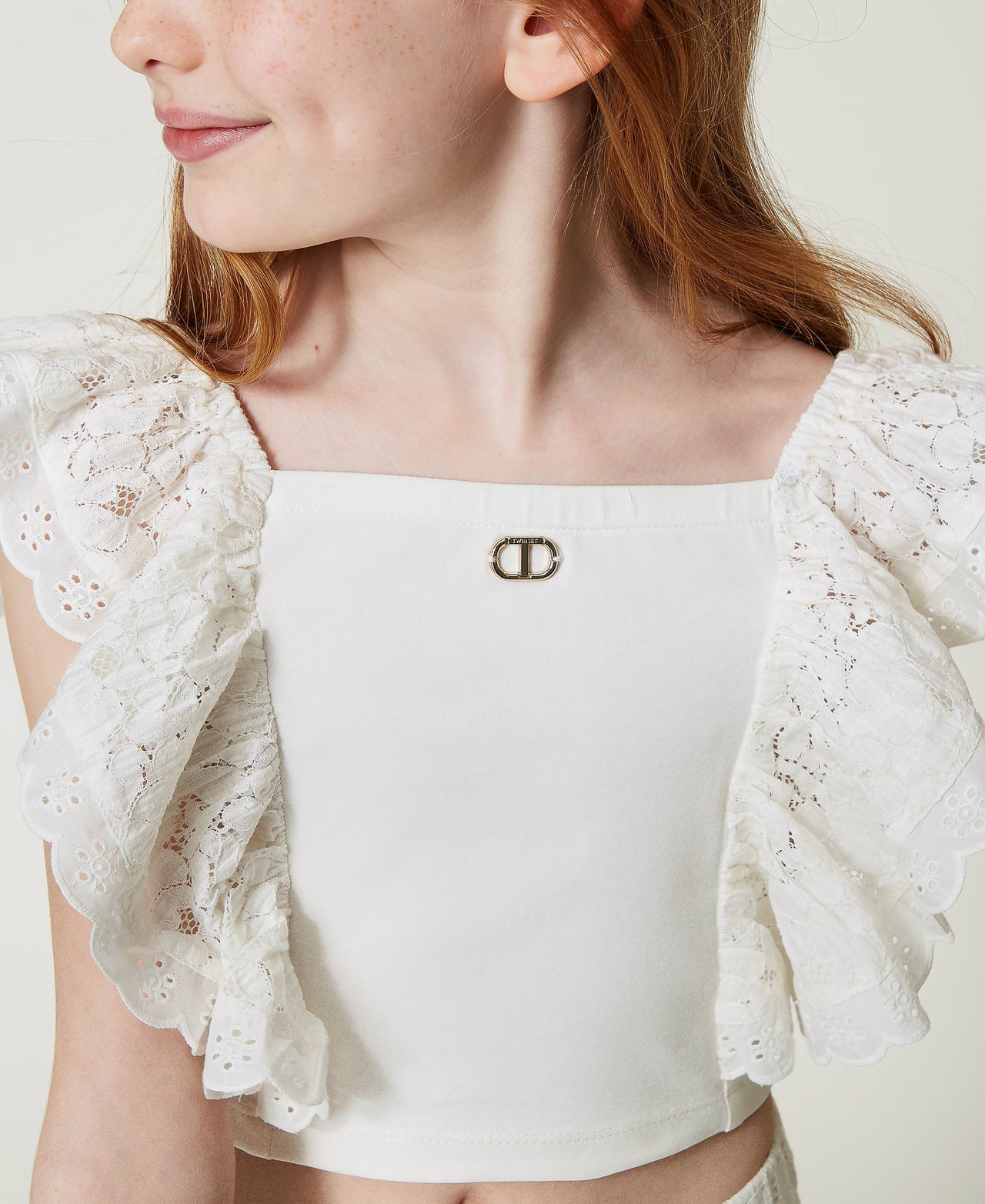 Top with lace and broderie anglaise ruffles