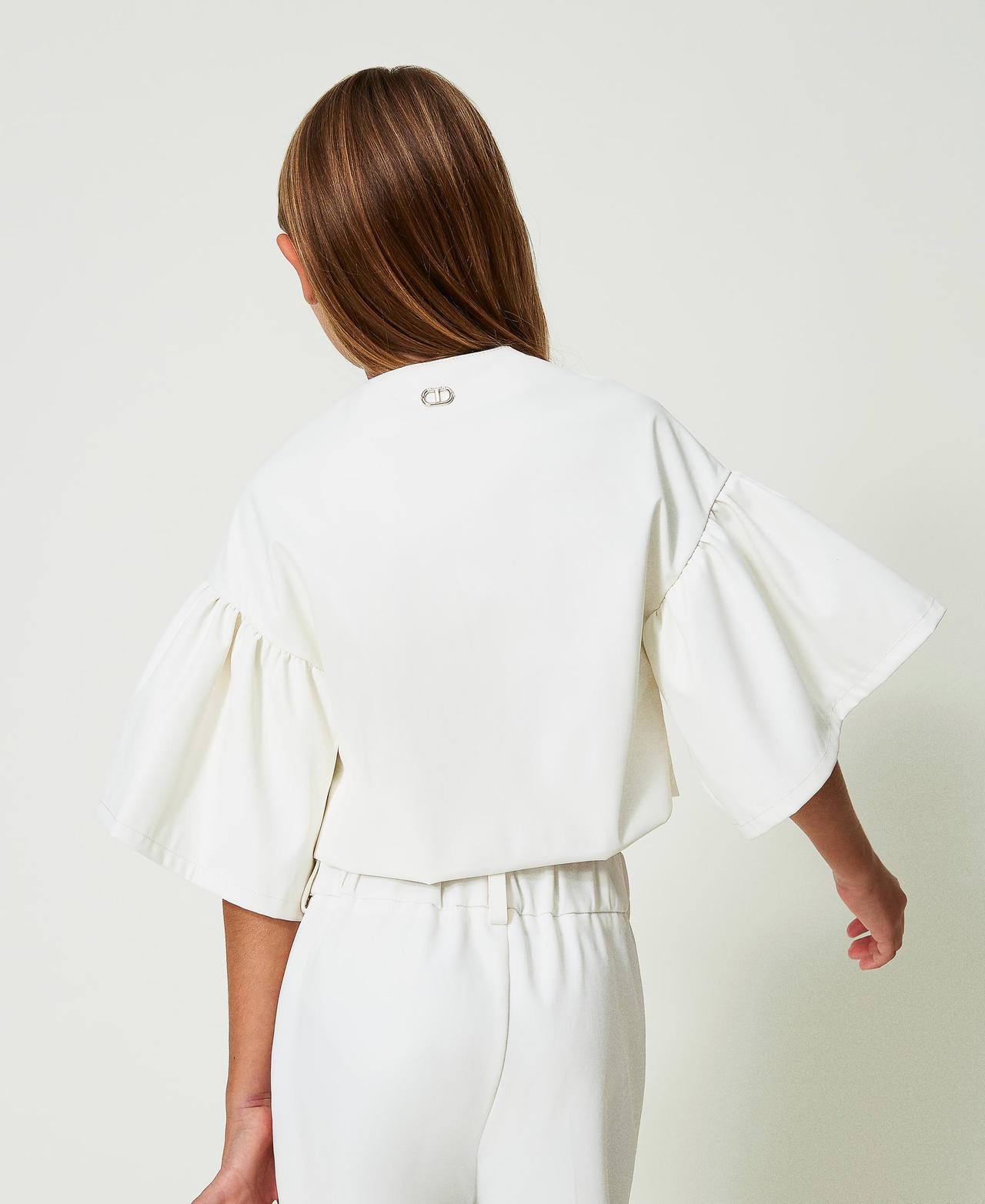 Blouson effet cuir avec fleur