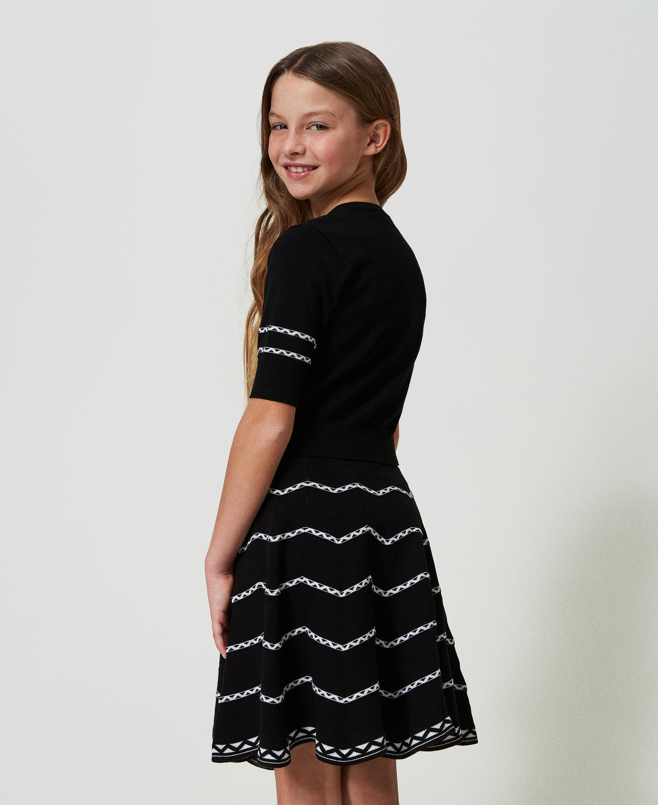 Short skirt with geometric pattern Two-tone Black / "Lucent White” Girl 241GJ3QD2-03