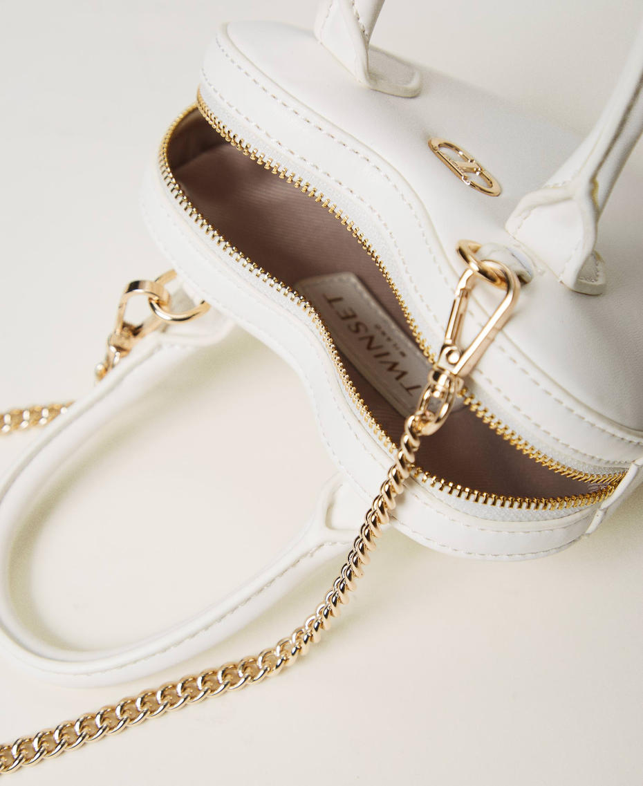 Cross shoulder bag with heart and logo