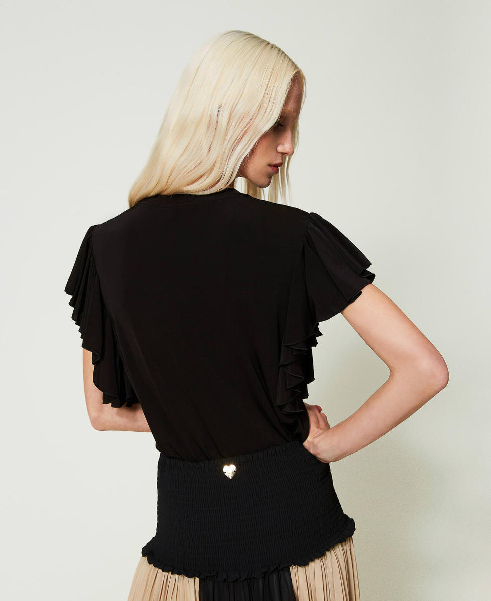 T-shirt con maniche ad aletta