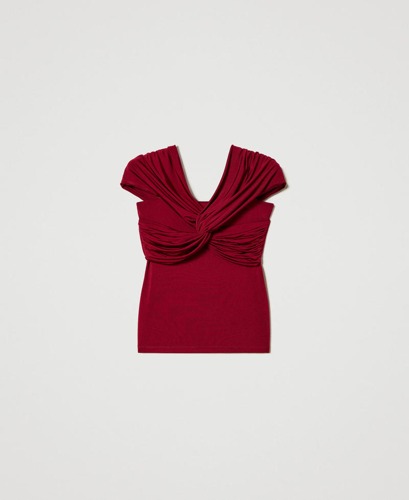Fitted top with draping