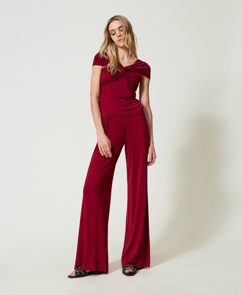 Fitted top with draping