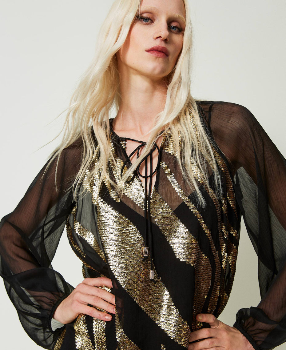 Blouse avec broderie animalière