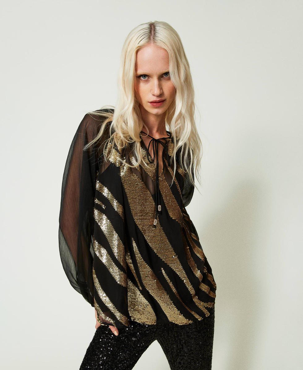 Blouse avec broderie animali&egrave;re
