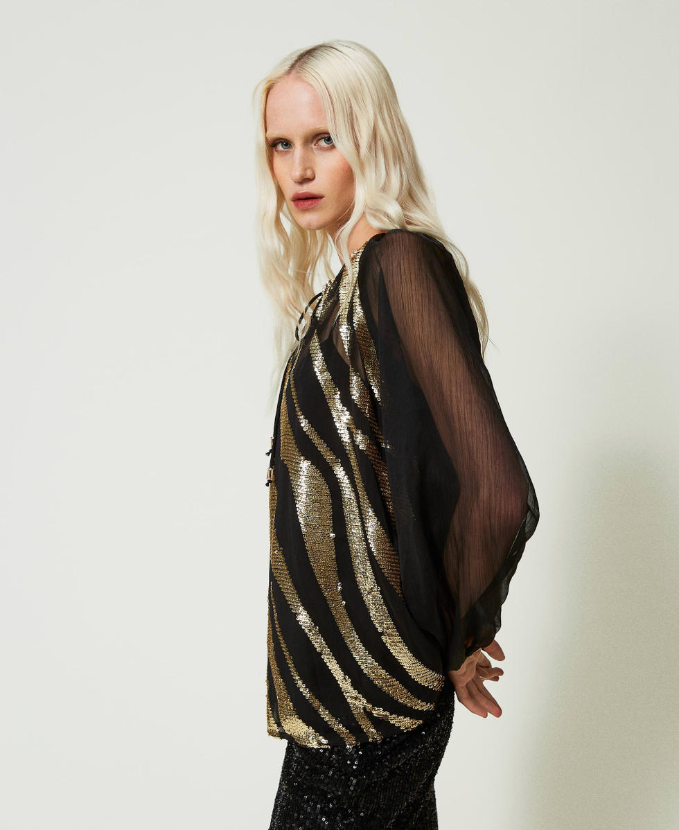 Blouse avec broderie animali&egrave;re