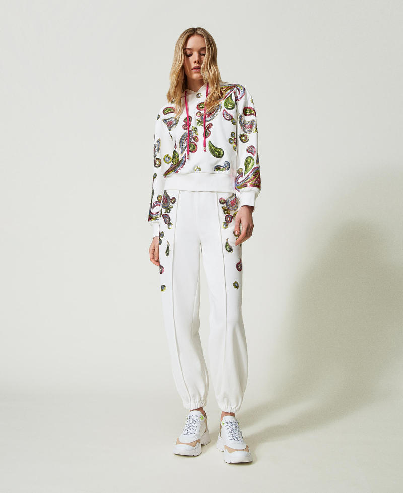 Joggers with sequin embroidery