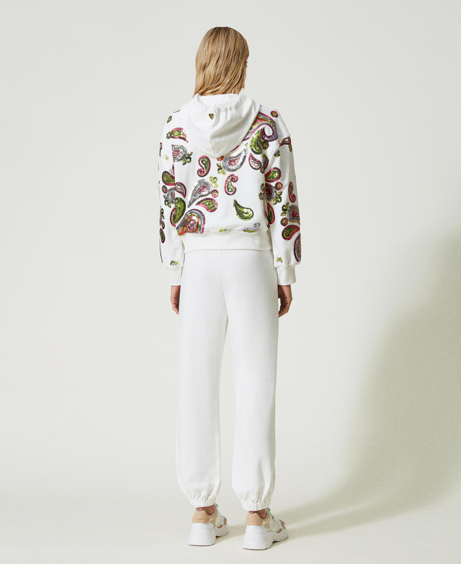 Joggers with sequin embroidery