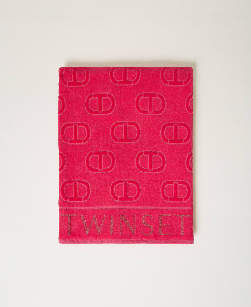 Terry beach towel with jacquard logo