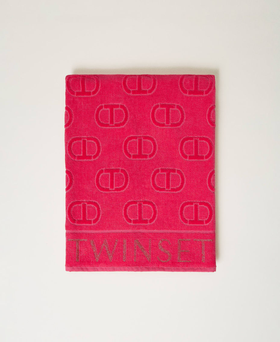 Terry beach towel with jacquard logo
