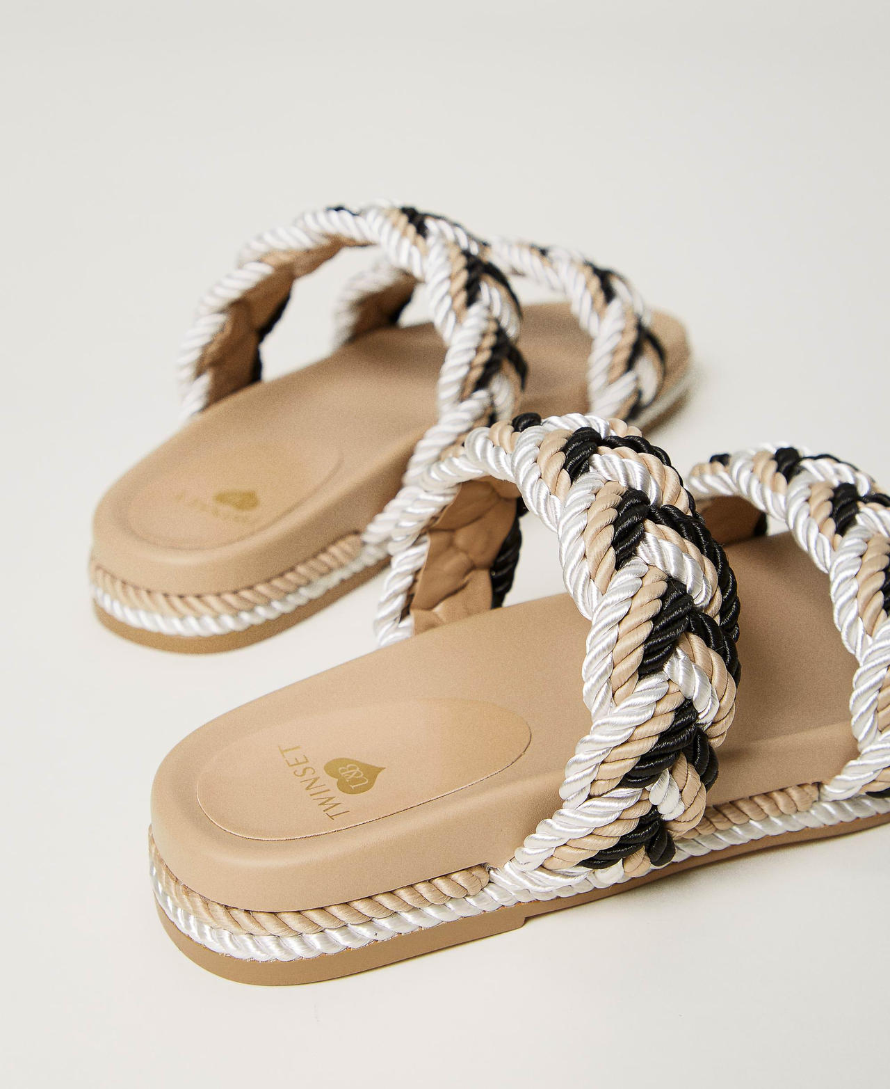 Slides with plaited band