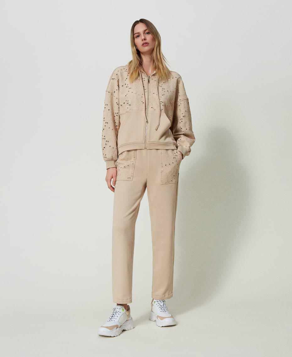 Joggers with broderie anglaise