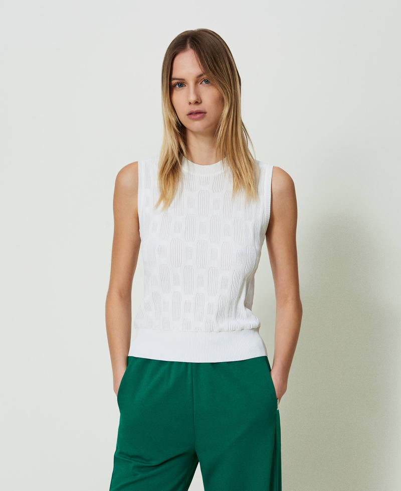 Knit top with geometric motif