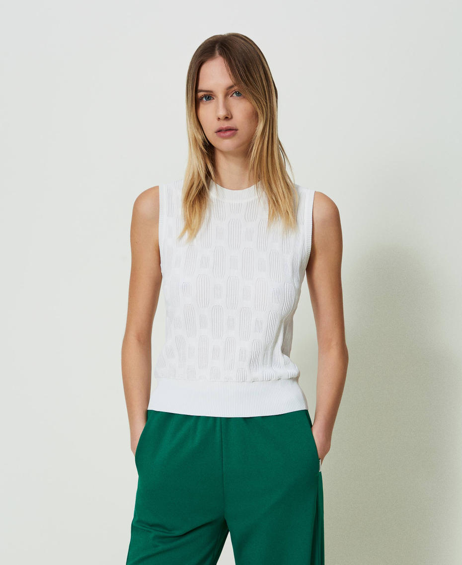 Knit top with geometric motif
