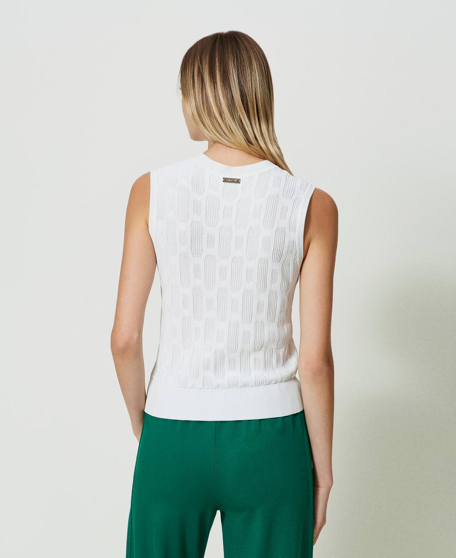 Knit top with geometric motif