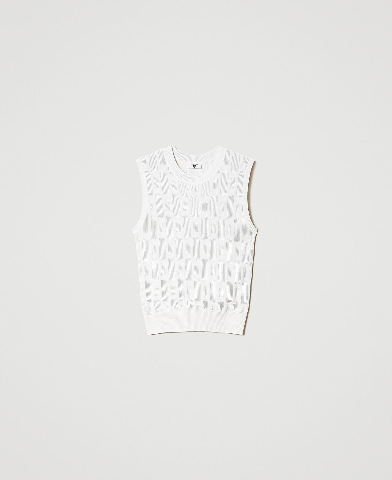 Knit top with geometric motif