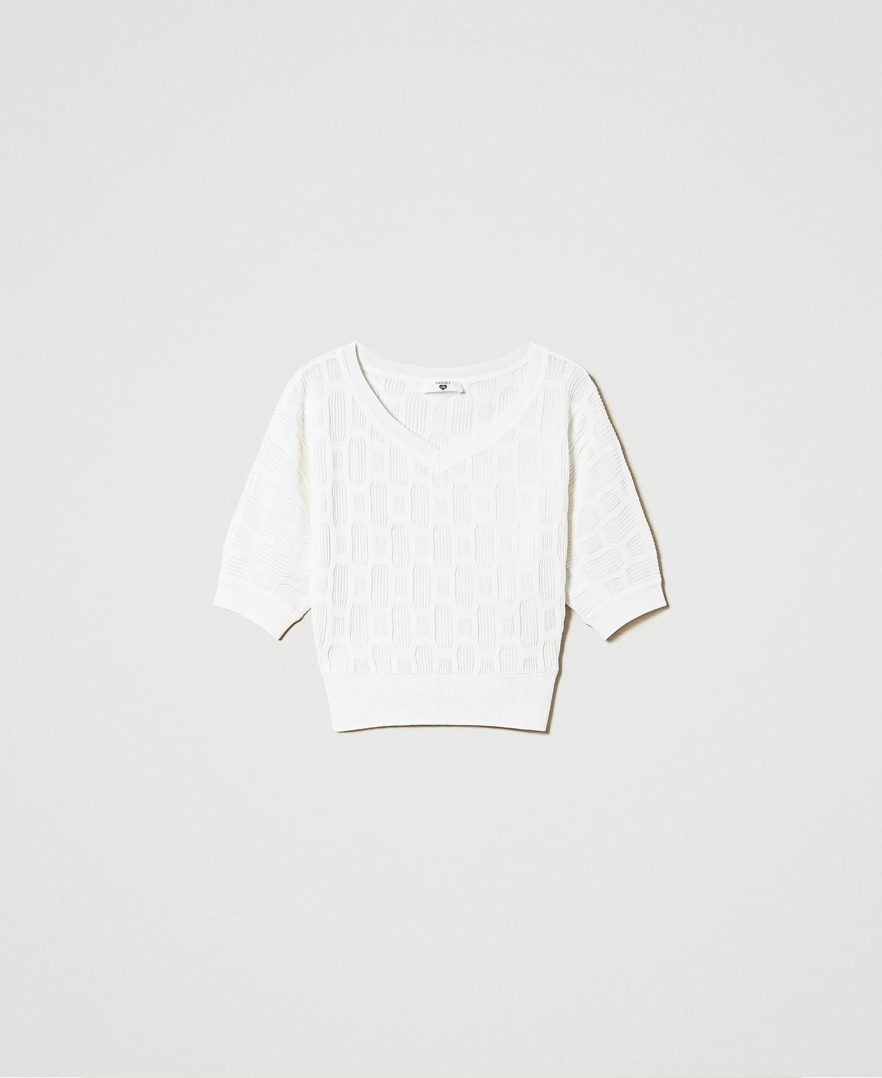 Jumper with geometric motif