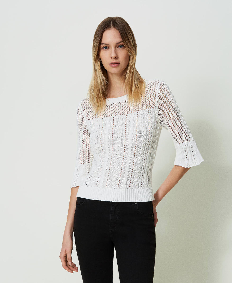 Pull avec m&eacute;lange de points et de torsades
