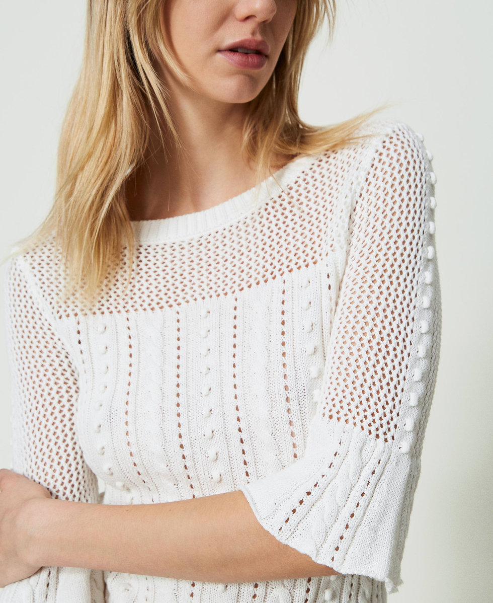 Pull avec m&eacute;lange de points et de torsades