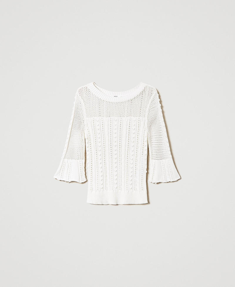 Pull avec mélange de points et de torsades