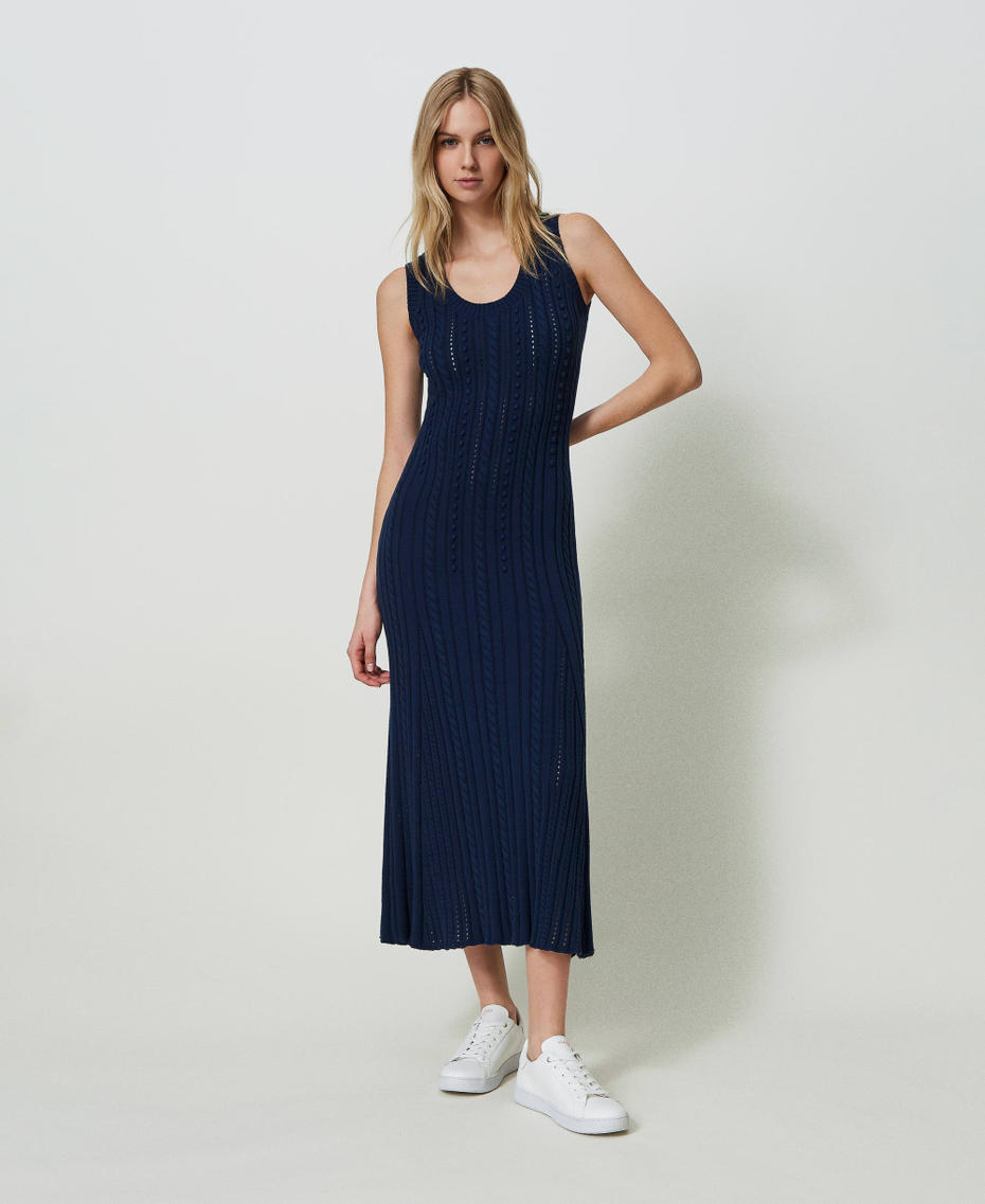 Long mixed stitch and cable knit dress