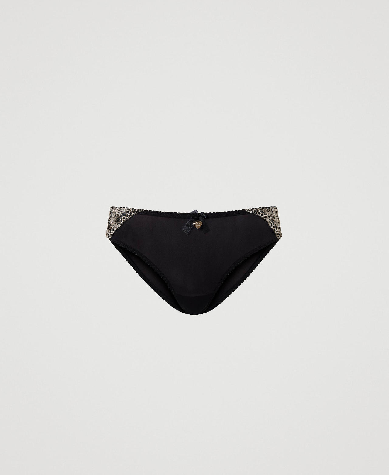 Briefs with embroidered tulle inserts