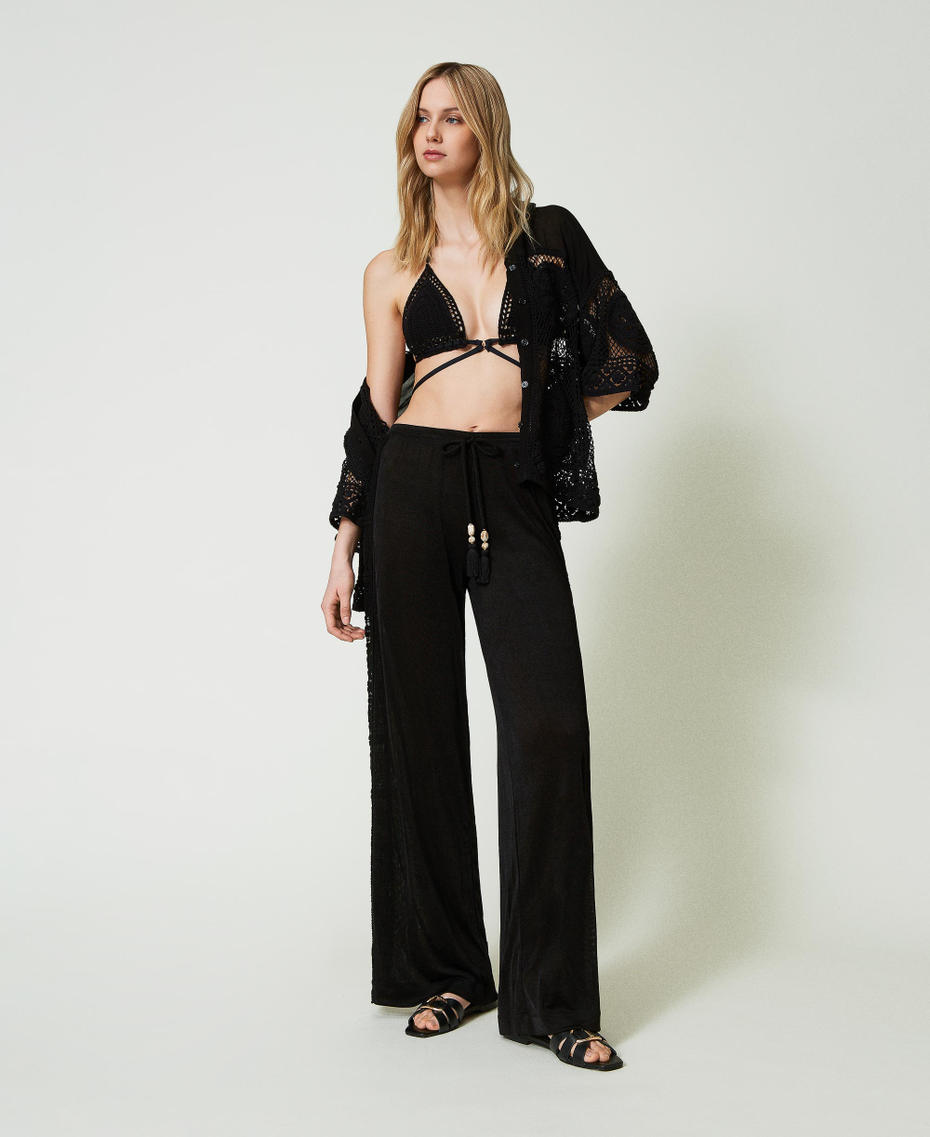 Palazzo trousers with crochet embroidery