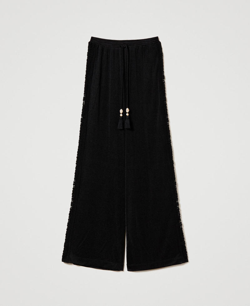 Palazzo trousers with crochet embroidery
