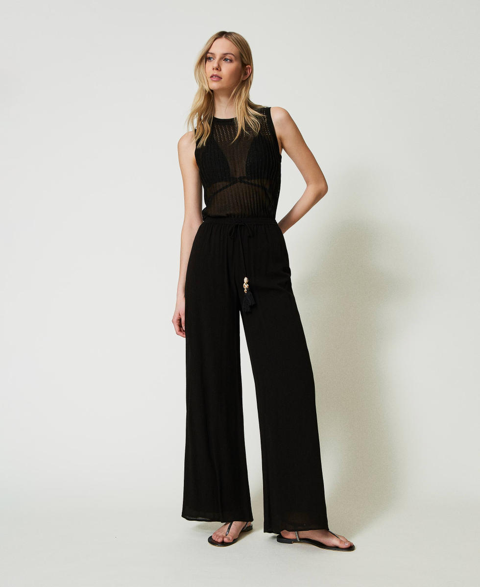 Pantalones palazzo negros on sale
