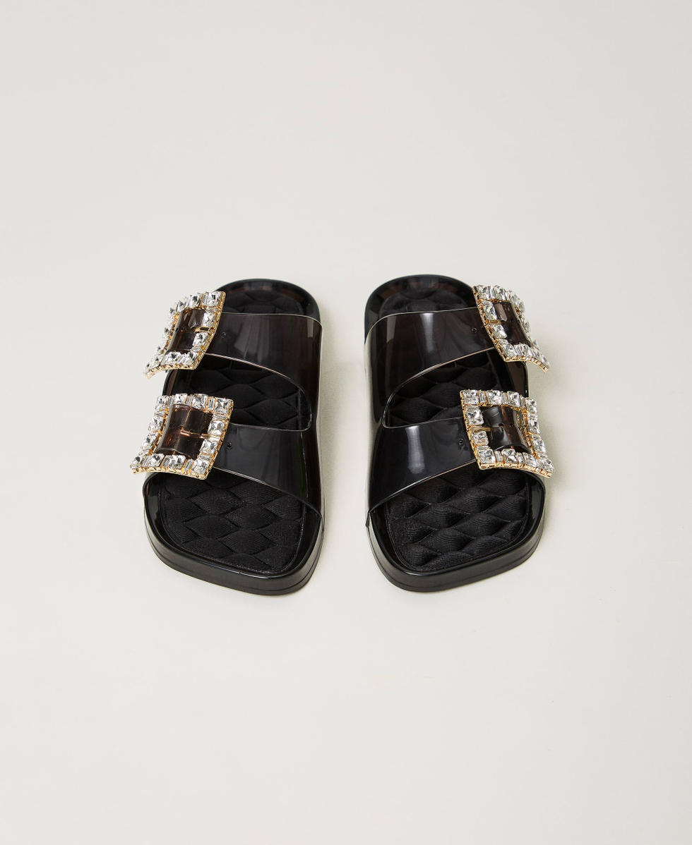 Black slides with gold buckle top