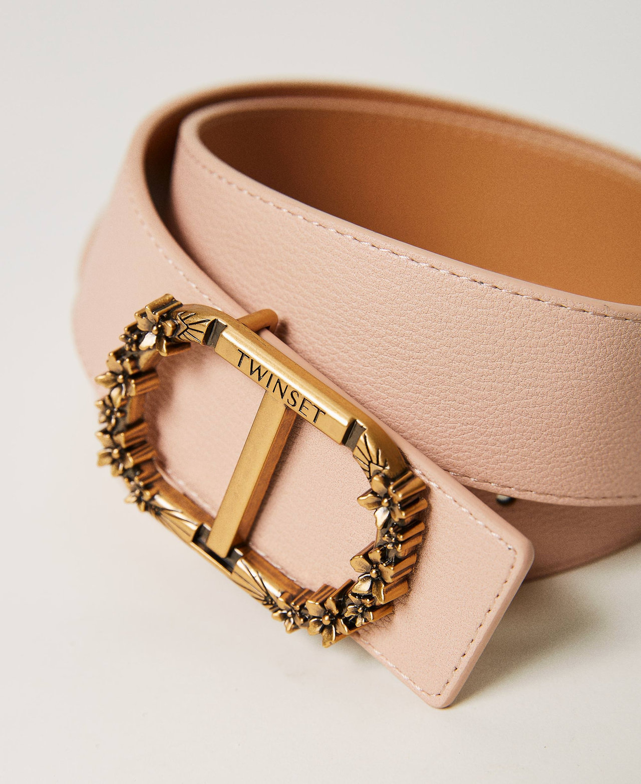 Low waist belt with floral Oval T buckle
