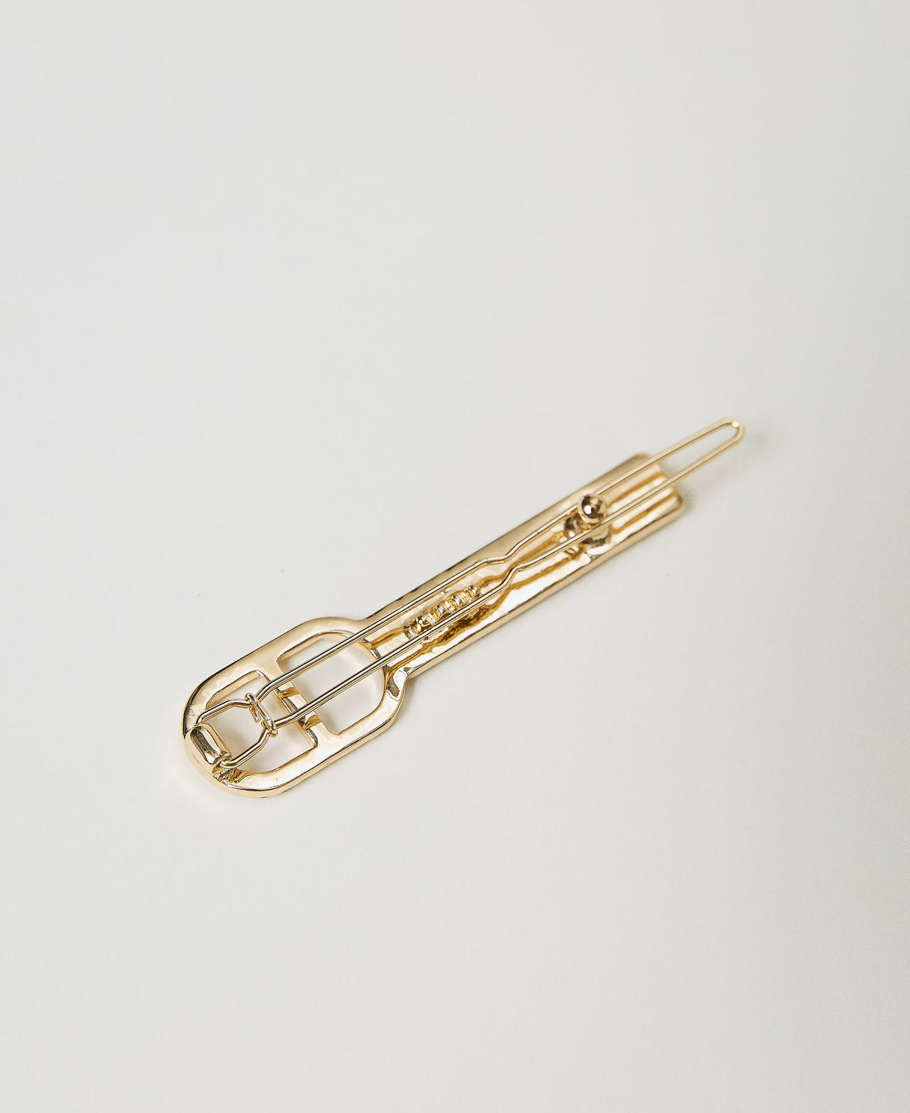 Hair clip with rhinestones and Oval T