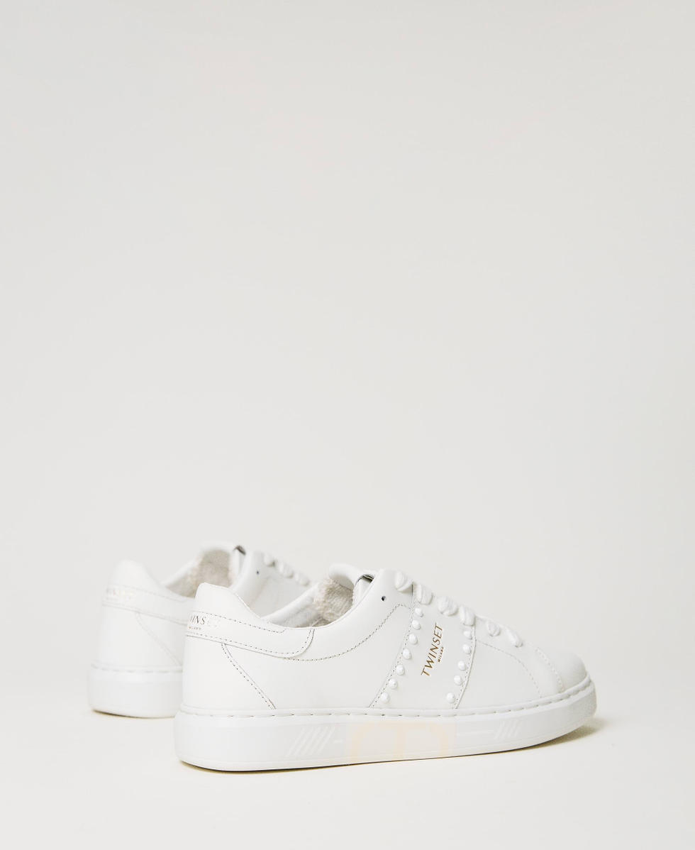 Sneakers de piel con tachuelas Blanco Mujer 241TCP014_00001_03