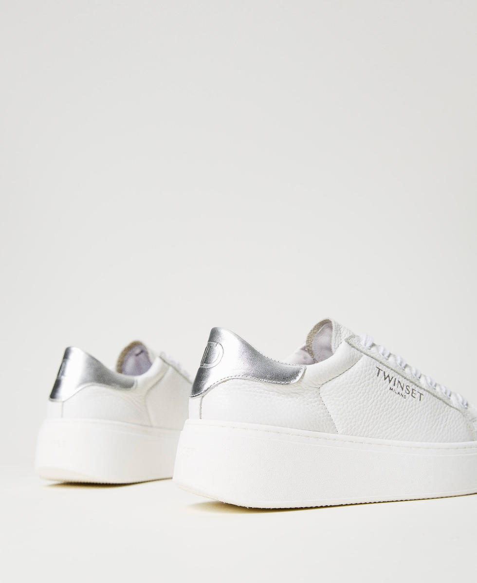 Metallic platform trainers store