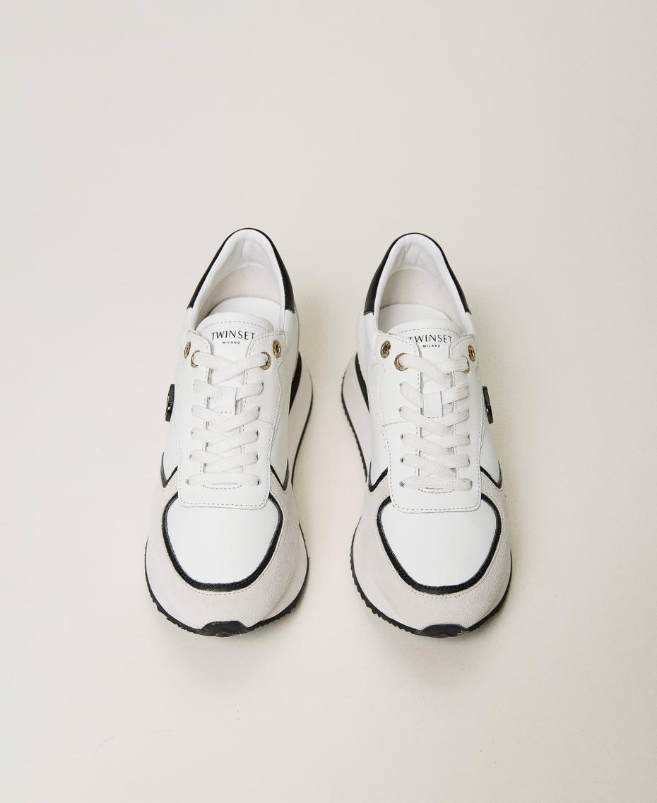 Wedge-Sneaker aus Leder Zweifarbig Optisches Weiß / Schwarz Frau 241TCP080-04