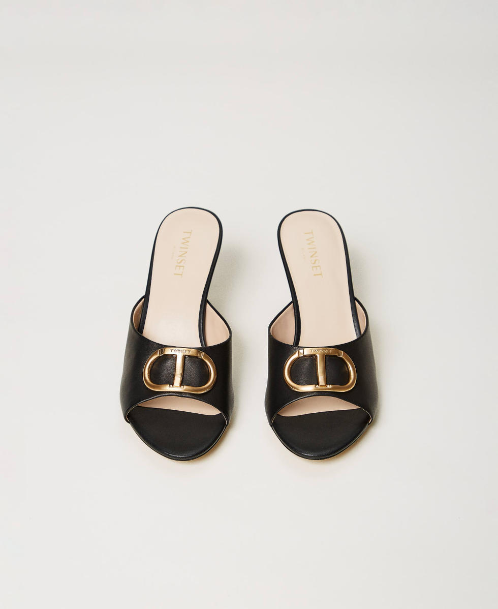 Leather mules with Oval T