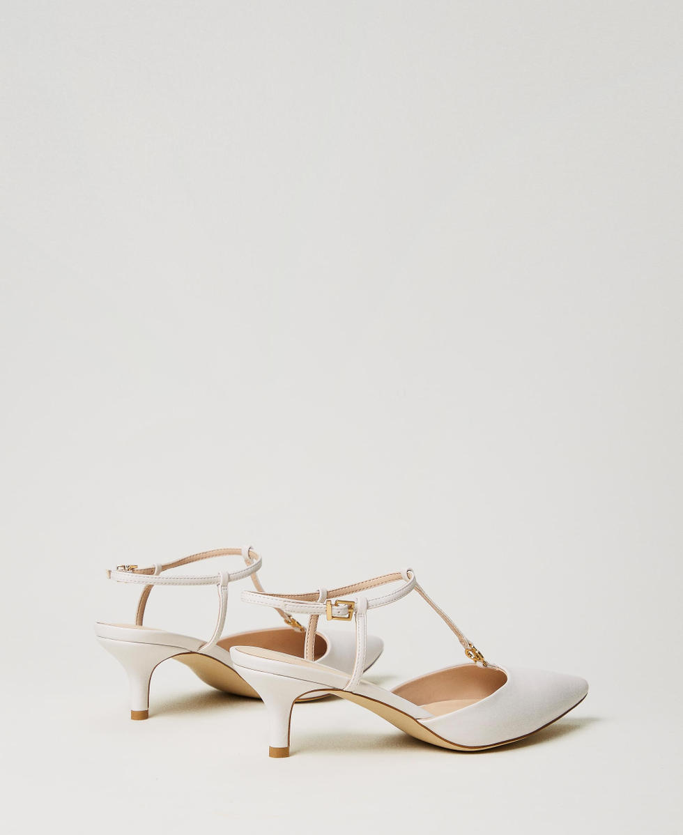 Sling back court shoes with Oval T