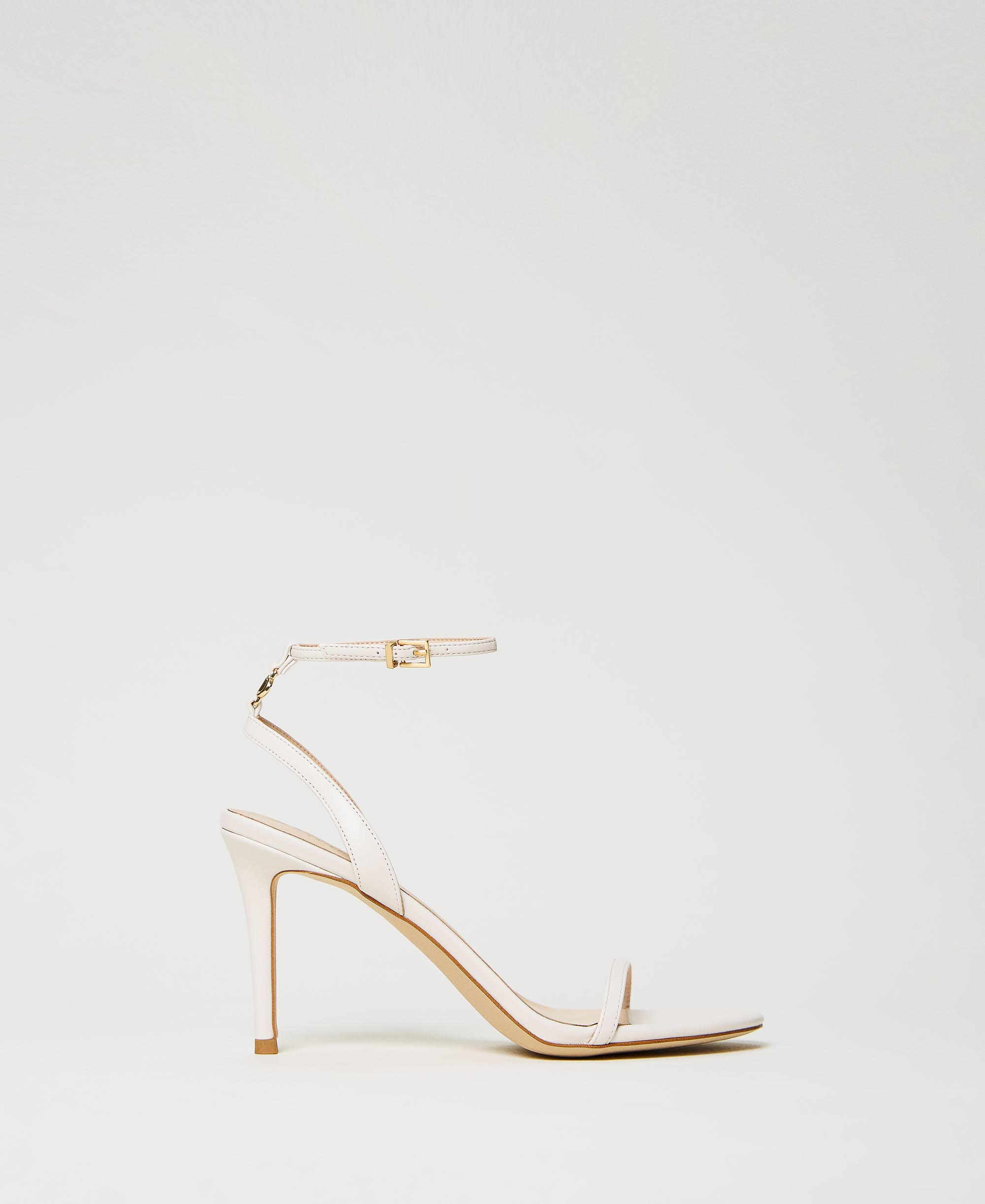 Sandali alti con Oval T
