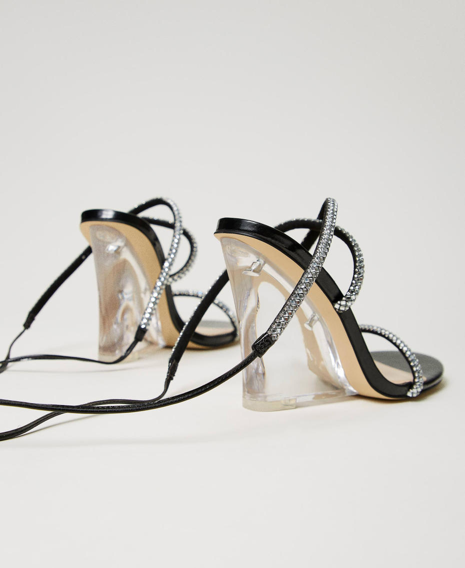 Sandales avec semelle compensée et brides strassées Noir Femme 241TCT032-03