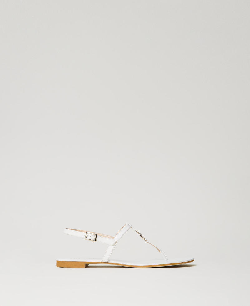 Flat thong sandals with Oval T