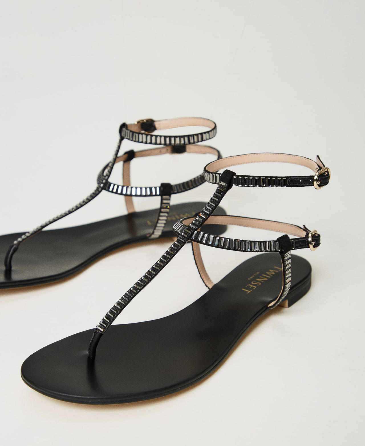 Flat thong sandals with rhinestones