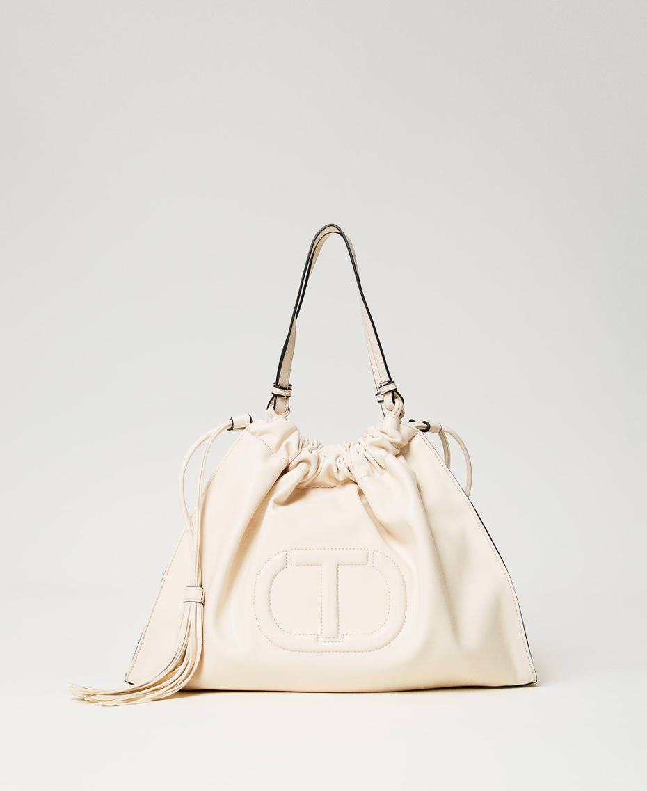 Hobo bag with Oval T and drawstring with tassels