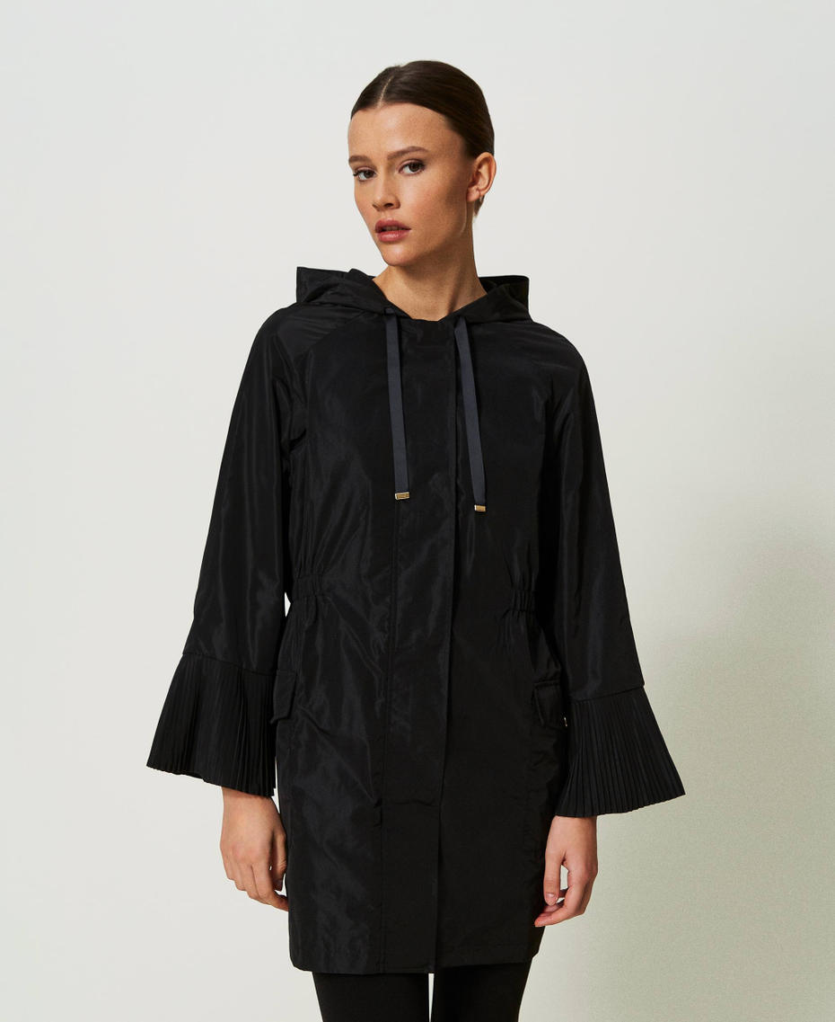 Parka en taffetas avec volants plissés