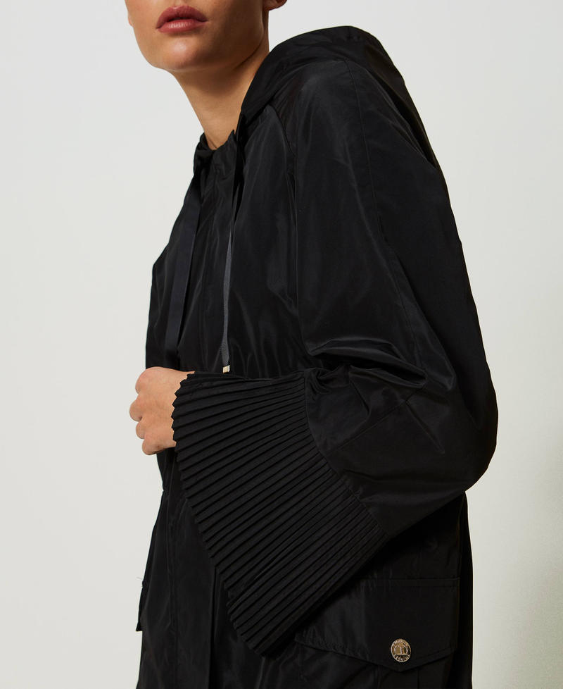 Parka en taffetas avec volants plissés