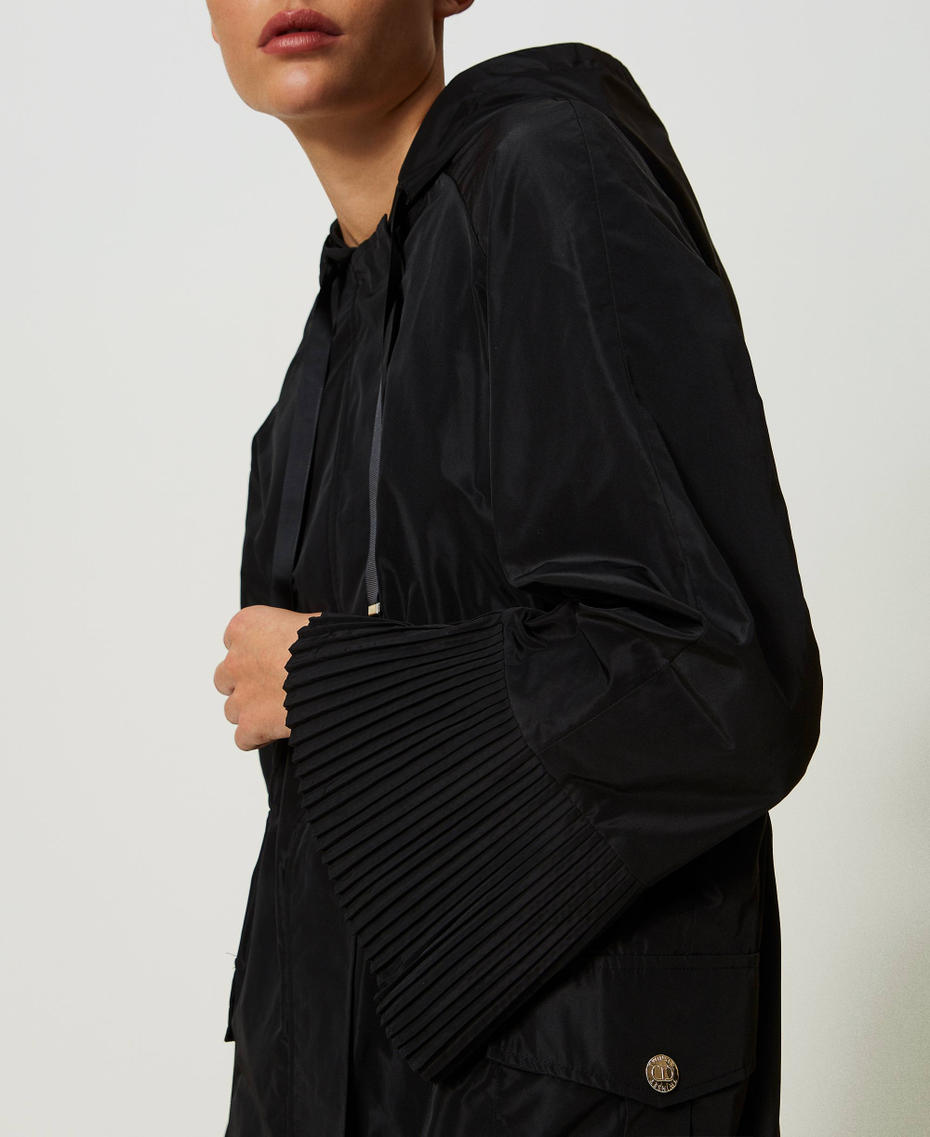 Parka en taffetas avec volants plissés